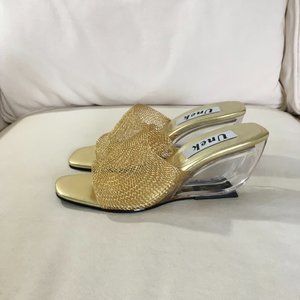 Unek Slinky Strap Plastic Wedge Heel